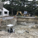 Extension d'une maison avec piscine intérieure 